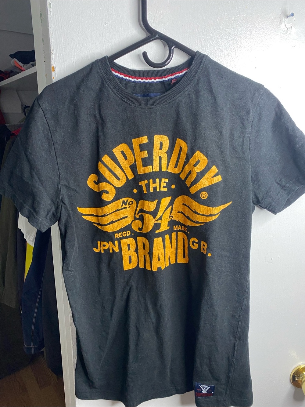 Superdry Black Tee with Bold Yellow Graphic